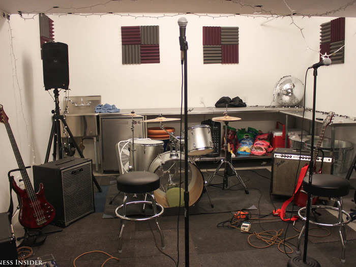 The company recently added this band room in the basement area. Some people like to come in here to sing, play music, or otherwise blow off some steam.