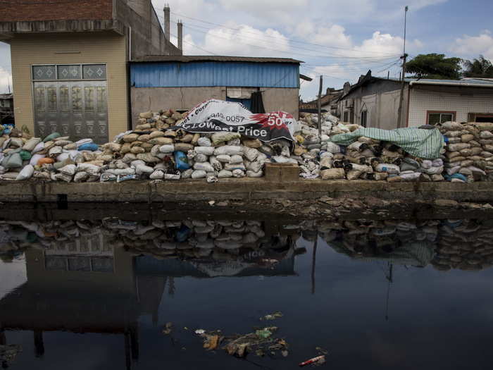 "The stench of burnt plastic envelops the small town, while some rivers are black with industrial effluent," according to Reuters. A 2009 study found that 80% of Guiyu