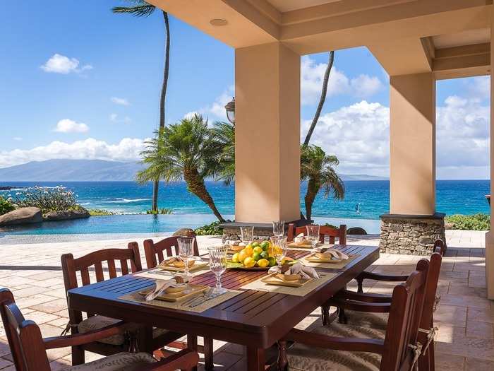 An infinity edge pool makes lunch on the lanai feel like lunch on the beach.