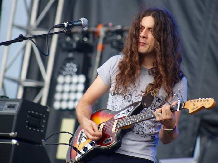 Festival favorite Kurt Vile played an abridge set after the rainfall.