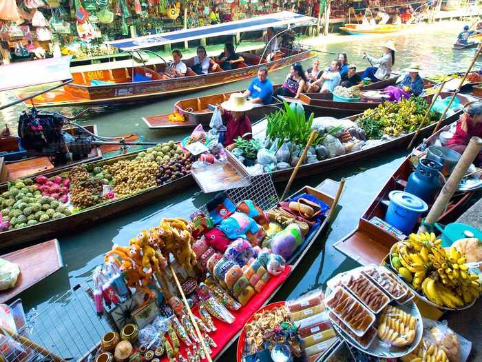 Browse the colorful food options at the Damnoen Saduak Floating Market in Bangkok, Thailand. Chances are, you won