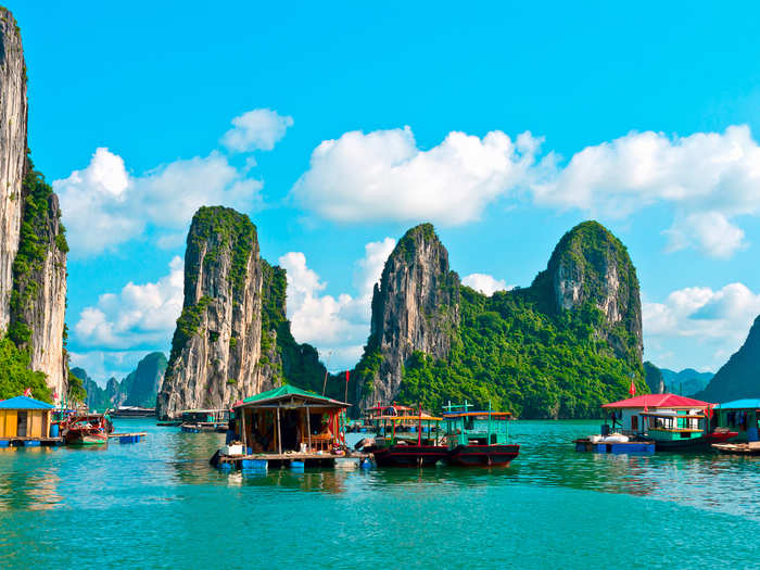 Cruise through Ha Long Bay in a junkboat, located in the Gulf of Tonkin in northeast Vietnam.