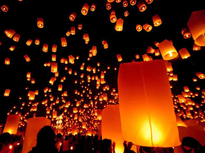 Light a lantern during Loi Krathong, a festival in Thailand where people light millions of lanterns and send them up into the sky. Some of the best places to see the festival are in Chiang Mai, Ayutthaya, and Sukhothai.