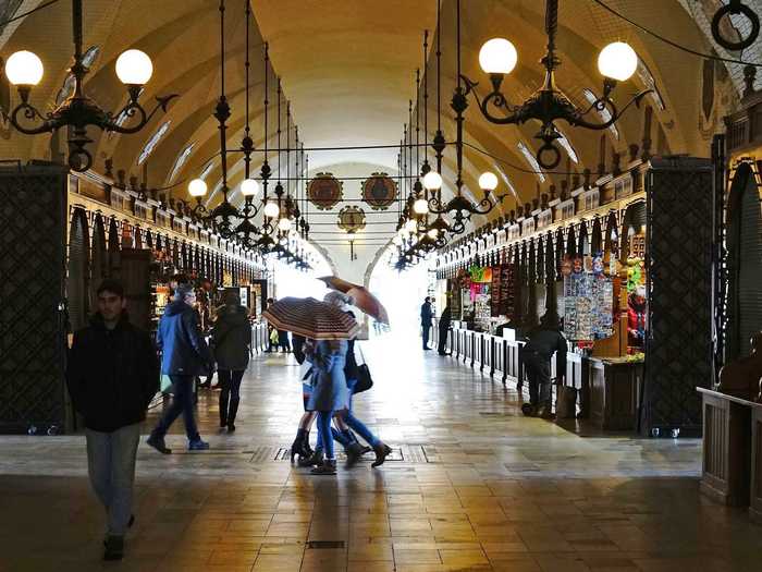 Rynek Glówny in Kraków, Poland, is the largest medieval town square in Europe, dating back to the 13th century. It