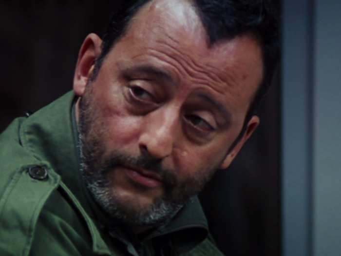 THEN: Jean Reno was pilot Franz Krieger, who helped save the day during the film