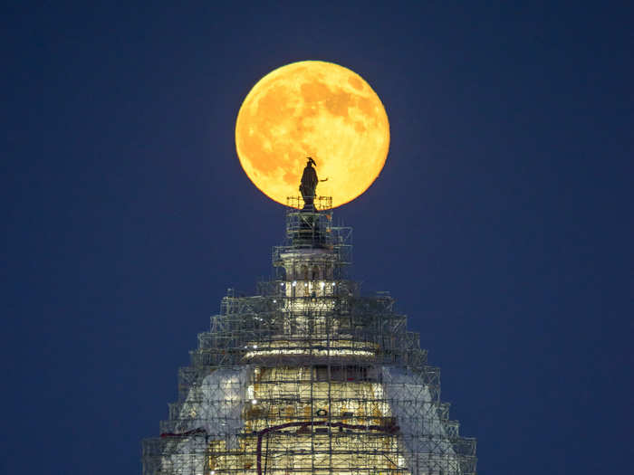 The Blue Moon rises over Washington, DC.