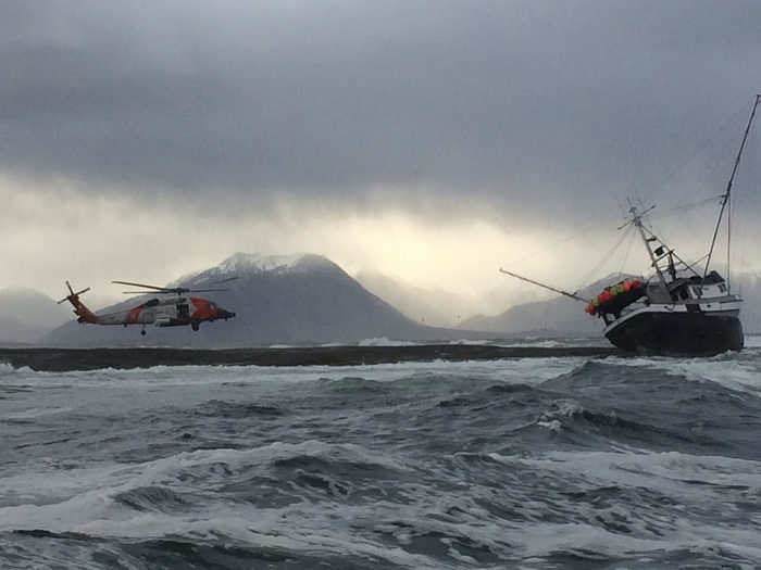 And the training is put to good use. Here, an Alaska Coast Guard MH-60 Jayhawk helicopter rescues two crew members from a stranded fishing boat after it ran aground.