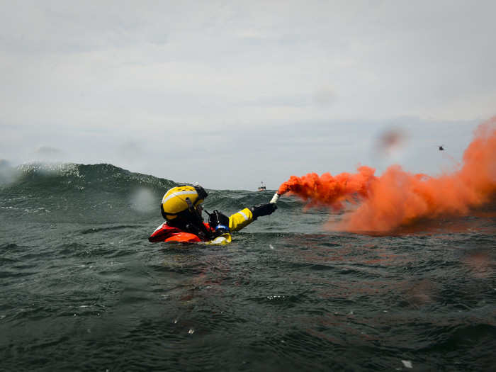 Coast Guard members train for rescue in all situations and scenarios. Here, the Coast Guard conducts a maritime helicopter rescue training session off of Cape Cod.