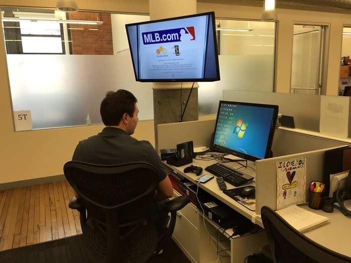 This MLBAM employee is testing a game on Xbox One. Yes, part of his job is to play video games.