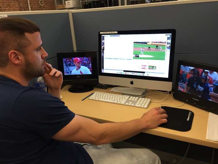 An MLBAM employee watches live streams of a baseball game and logs different events, like pitches, balls, strikes, etc.