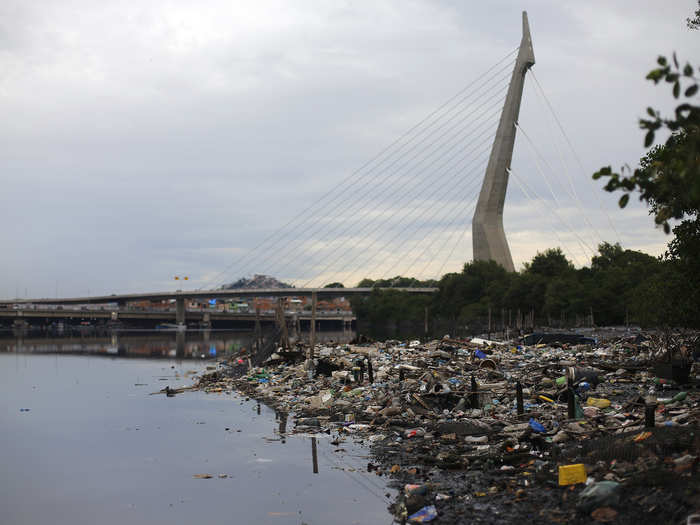 Guanabara Bay, the site of sailing, is among the most polluted waterways in the city.