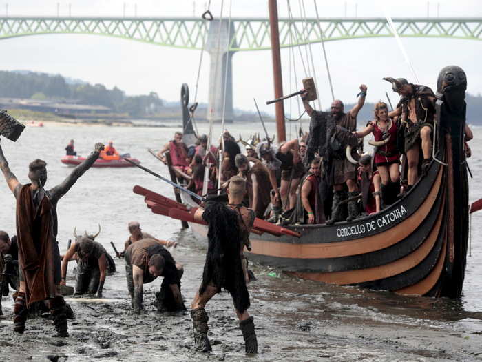 Once the Viking ship lands on the muddy banks of the Ulla, the mock battle is on.