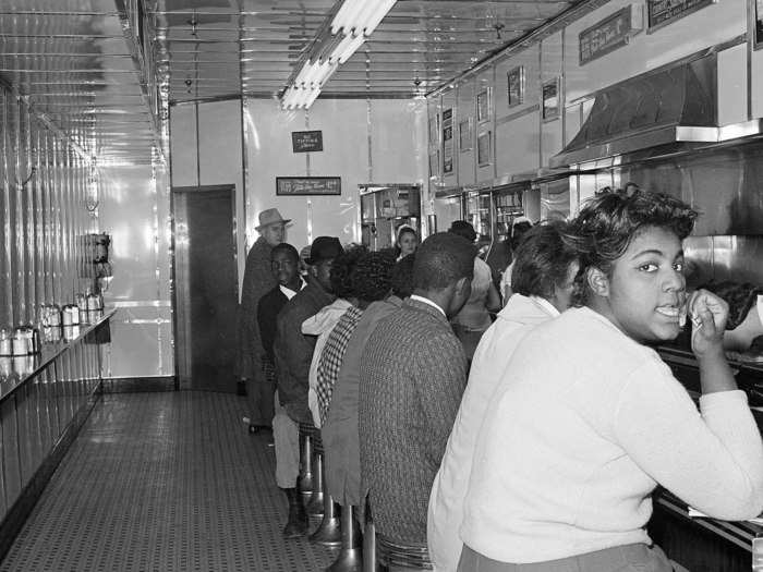 Lunch counter sit-ins swept the US as African-Americans demanded desegregation of public facilities.