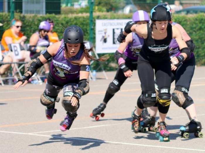 And this is why we wear so much protection. Roller derby is a full contact sport and we all fall over a lot. This is me during an annual outdoor tournament in Britain, only five days before RollerCon, called Eastbourne Extreme.