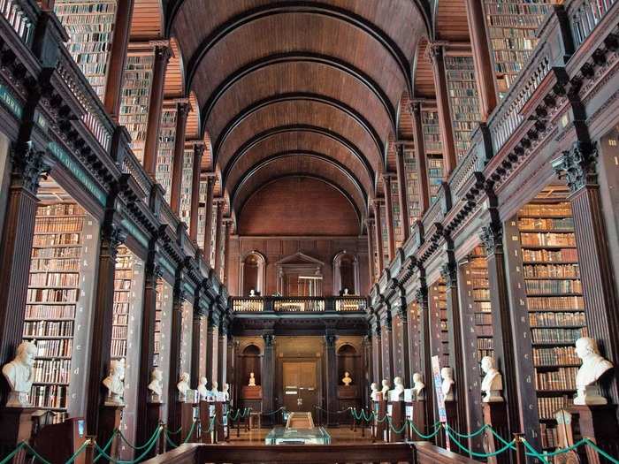 The most famous room in the Trinity College Dublin Library in Dublin, Ireland, is over 200 feet long and is adequately named the Long Room. The dark wood and old books in this library — which houses the largest collection of books in Ireland — will make you feel as though you