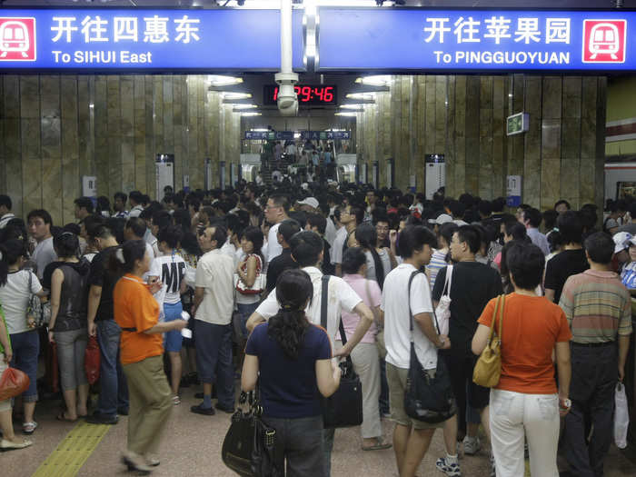 Rush hour in Beijing frequently features packed corridors and long lines to board trains. In 2008, foot traffic was even worse in preparation for the Olympic Games.