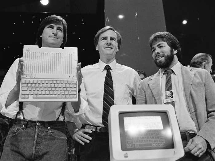 In 1977, Wozniak designed the Apple II, which went on to become one of the first majorly successful personal computers available for mass purchase. Here Jobs, then Apple CEO John Sculley, and Wozniak showed off the Apple IIc. Revealed in April 1984, the computer was Apple