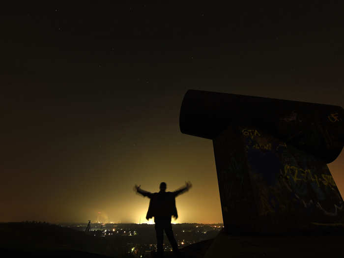 A German man waits for shooting stars on a mining dump.