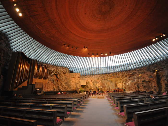 Built into a rock, the Temppeliaukio Church in Helsinki gets ample sunlight through a glazed dome. Those rough rock walls were left untouched by the designers for a reason: naturally great acoustics make the church a perfect venue for concerts.