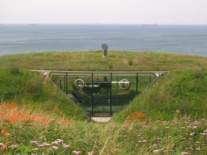 Built in 1996, this hobbit-like house in the Welsh countryside is a tunnel under a turf roof. The three-bedroom house with stunning ocean views resembles a home that featured in a famous British children’s TV show — locals call it the Teletubby house.