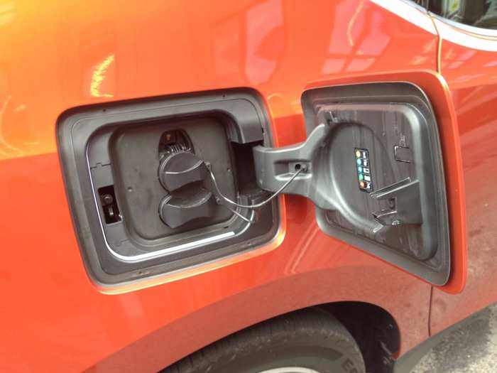 The charging ports are easy to access, at the rear of the car.