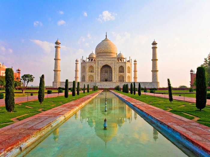 A stunning architectural masterpiece constructed of white marble, the Taj Mahal is India