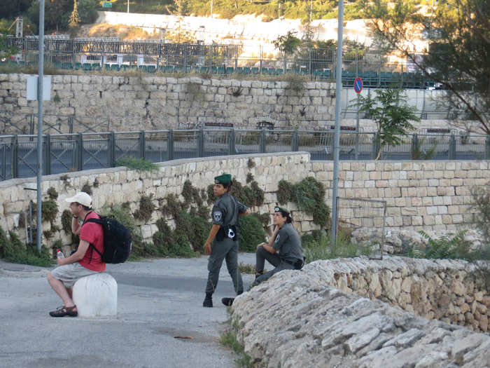 Everyone in Jerusalem is cohabiting peacefully. Millions of tourists visit as well. Police and soldiers are everywhere, but, like these two Israeli soldiers, the atmosphere is chill. This is a friendly, safe area of the country.