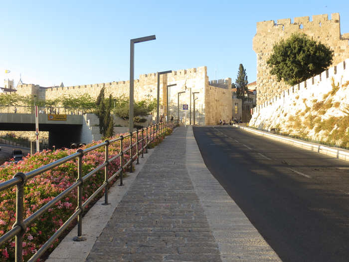 There are many gates to enter the old walled city. The biggest is called the Jaffa gate. A road leads up to it.