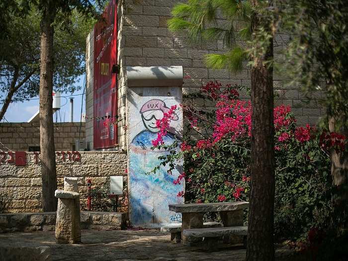 A piece of the Berlin Wall resides in Ein Hod, Israel. Ein Hod was founded in 1953 by a group of artists and remains an art-centered community where around 150 artists and their families reside.