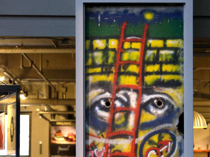 A three-ton portion of the Berlin Wall is on permanent display at the Armory in Seattle, Washington.