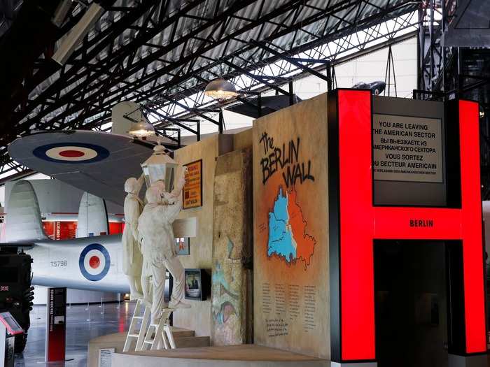 Sections of the Berlin Wall stand as historical remnants in the Cold War exhibition of the Royal Air Force Museum, located in the village of Cosford, England.