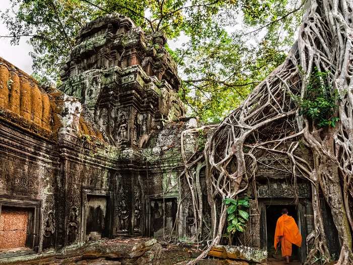 Ta Prohm is one of the most photographed temples (and famous for being featured in “Lara Croft: Tomb Raider”). It is purposefully unrestored, and eerily magical as it