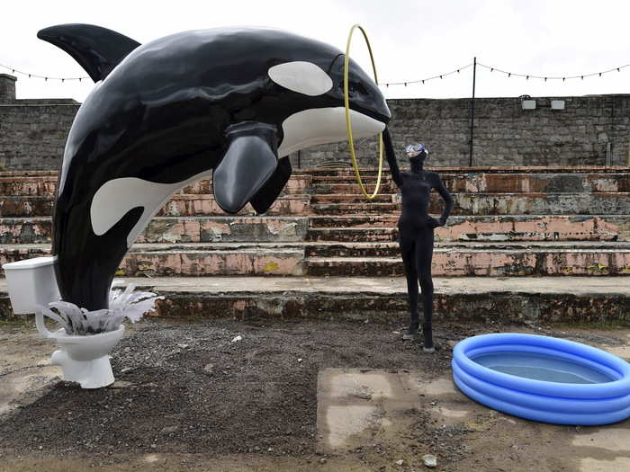 Many of the art pieces are sharp critiques on modern amusement. This one appears to take a shot at Sea World, which was ripped apart by the 2013 documentary "Blackfish."