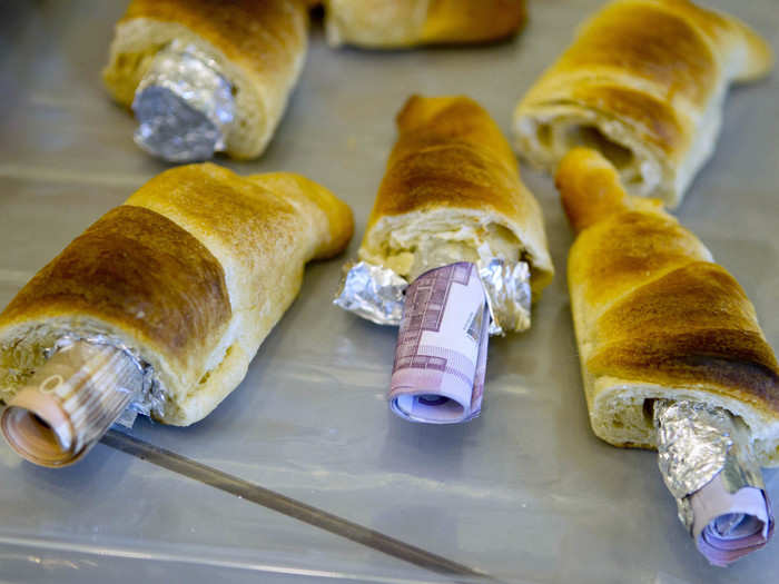 German customs agents foiled a money laundering operation after finding currency stuffed inside croissants.