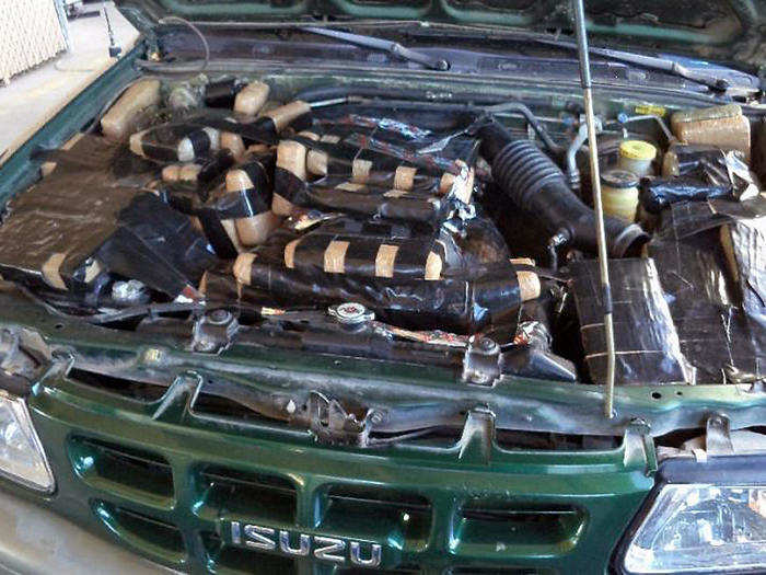 The smugglers behind this attempt filled the hood of their car as well as various parts of the vehicle with marijuana.