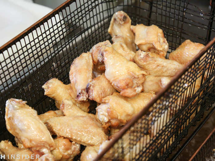 With the exception of football game nights when demand is particularly high, bone-in wings arrive from the warehouse fresh, not frozen. Every batch is cooked to order.