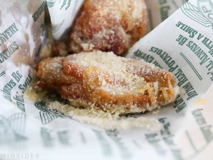 The equally surprising and savory Garlic Parmesan wings taste like chicken-topped fettuccine alfredo. The owner tells me that Wingstop wants to make wing flavors you can