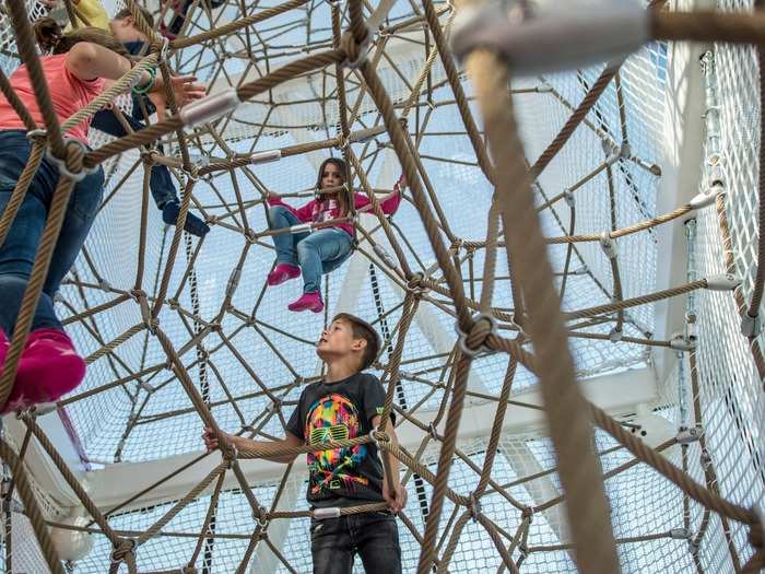 Four different levels make up the play tower, where children can climb to the highest point of the net at 45 feet.