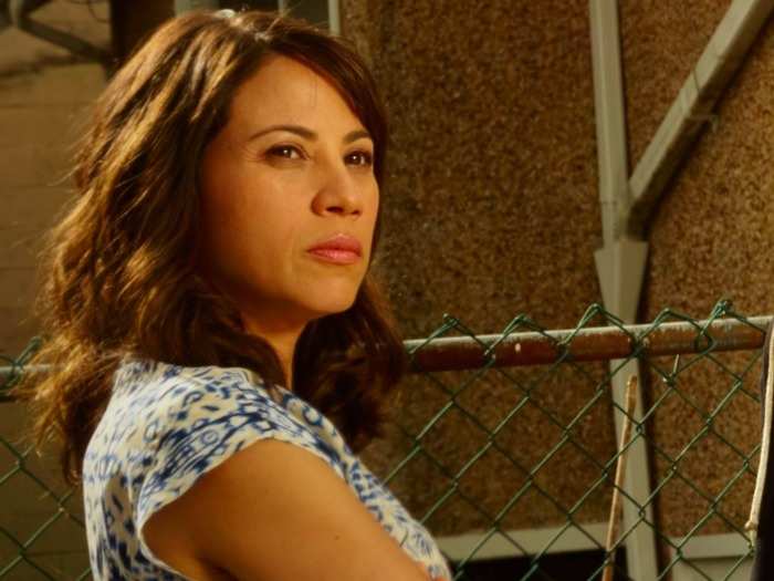 His ex-wife is Lisa Ortiz (Elizabeth Rodriguez).