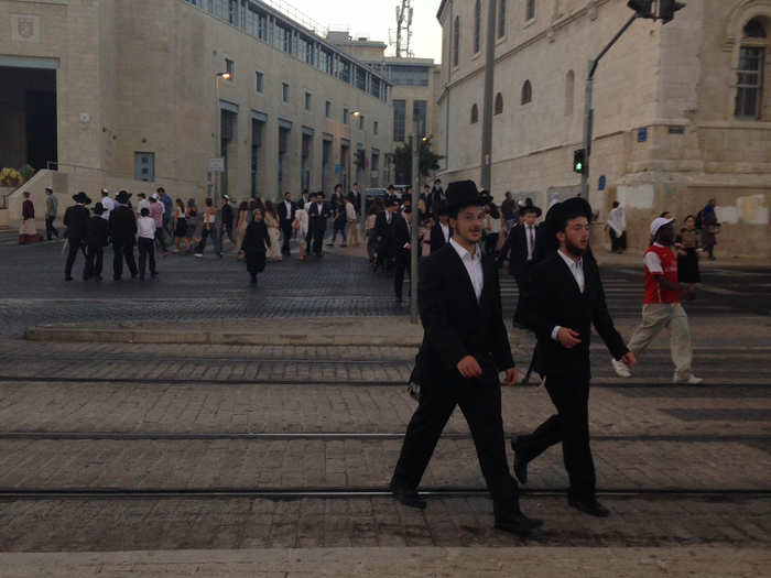 On Friday night in Jerusalem the streets fill up with people in their finery rushing off to prayer services.