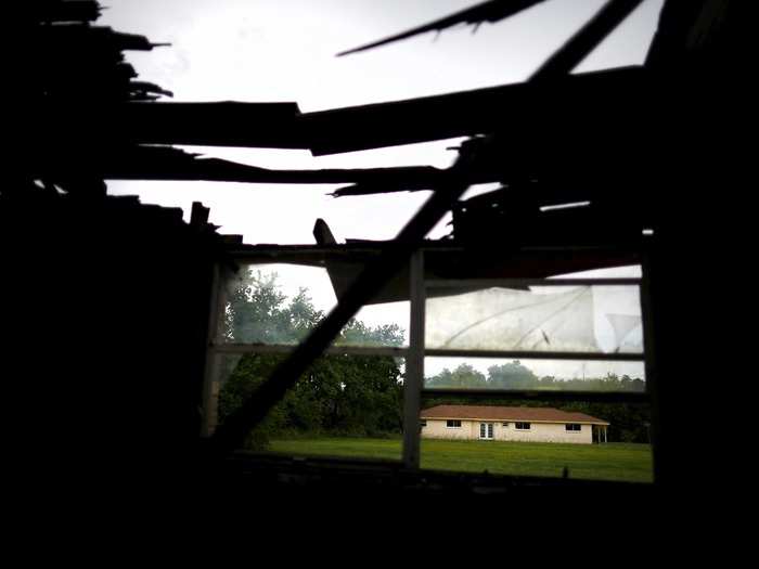 New Orleans is protected by a series of flood walls and levees — structures that have for centuries been able to keep the city from going underwater. But Katrina was too much for the under-maintained levees, and they quickly broke from the force of incoming water, destroying houses like this one in the city