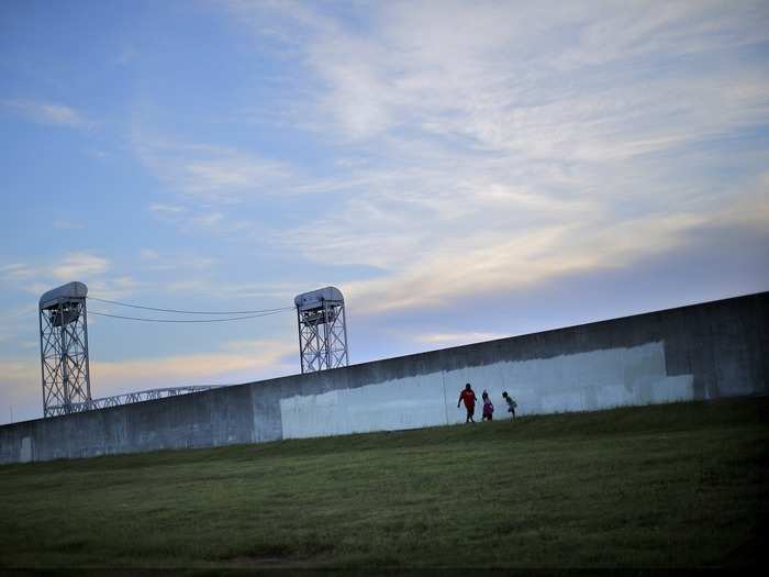 Since then, the federal government has poured billions of dollars into rebuilding levees like this one in the Lower Ninth Ward.