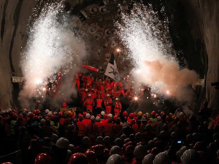 After months of boring and excavating, the two massive machines reached the midpoint of the tunnel in October 2010, joining the two construction segments.