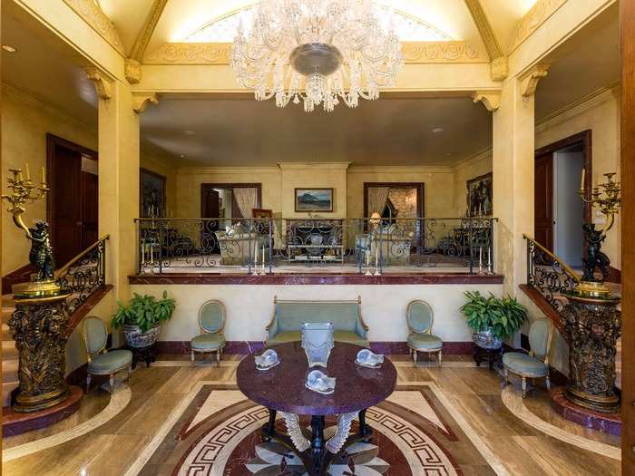 The current owner decorated the home with $2.5 million in luxurious accessories, including Baccarat chandeliers and hand-woven carpets. Both are included in the final sale.