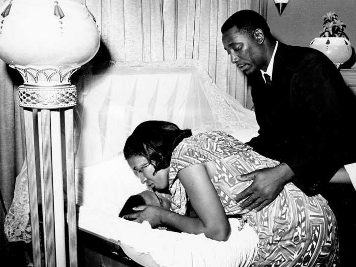 The assassination of Medgar Evers, the first director of the Mississippi NAACP, on June 12, 1963 also created outrage and sorrow in the black community. Below, his widow, Myrlie Louise Evers, bends down to kiss her deceased husband at a public viewing at a funeral home in Mississippi.