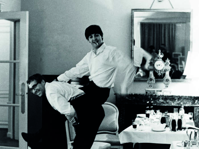 McCartney and road manager Mal Evans found ways to entertain themselves while on tour. "When you’re in hotels, you just look for things to do and have a bit of fun," Starr says. This was taken in France. "By looking at the table, we’ve probably had a few drinks."
