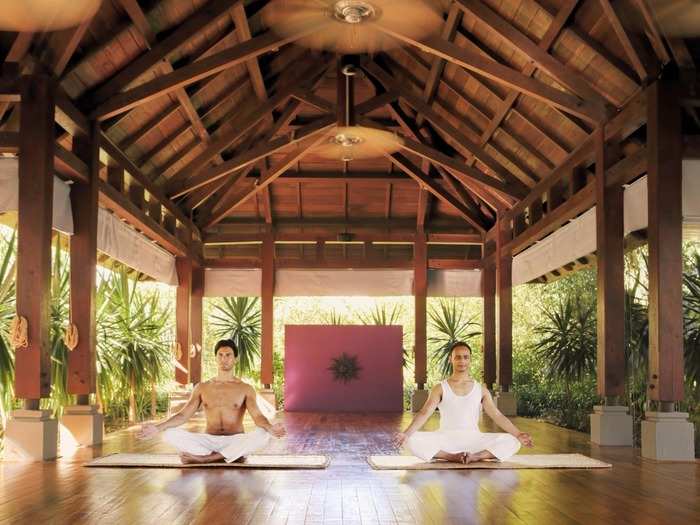 The Nira Spa at the Shanti Maurice resort in Mauritius mixes Ayurvedic and Vedanta techniques, along with water fitness, yoga, and a signature exfoliation skin treatment that takes place by a bonfire on the beach with organic cane sugar. What more could you want?