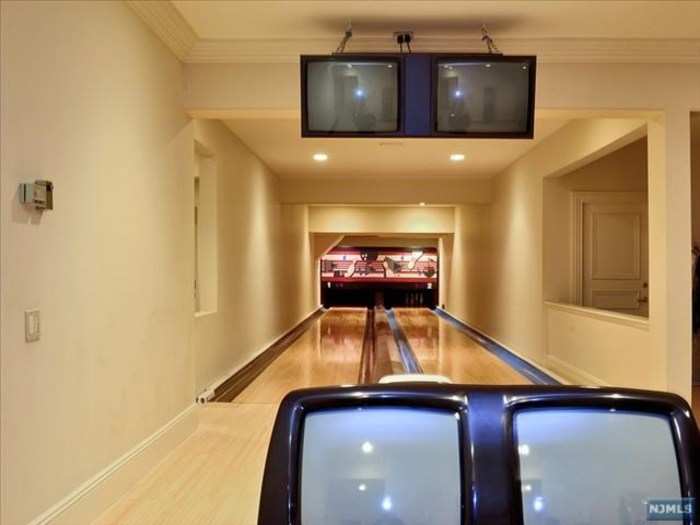 A full-size bowling alley awaits in the basement.