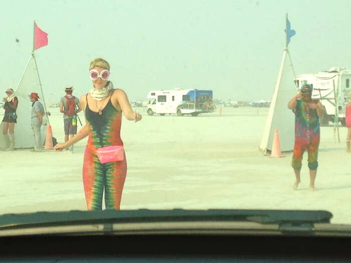 I was greeted by veteran burners. Being a "burn virgin" myself, I had to get out of the car and roll around in the dust as is customary for all first-timers.