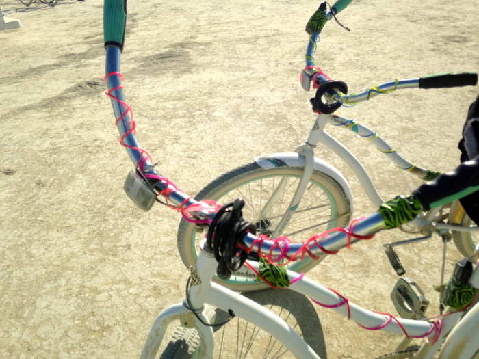 Each bike has to be covered in el wire, which lights up at night so people don